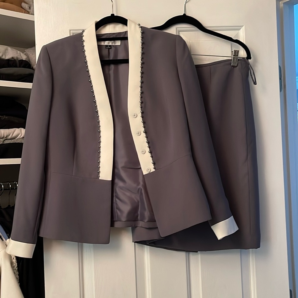 Grey and white suit featuring faux pearl detail